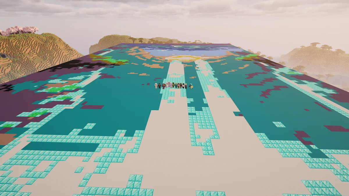 Players gathered on the large turquoise sword artwork, viewed from a distance