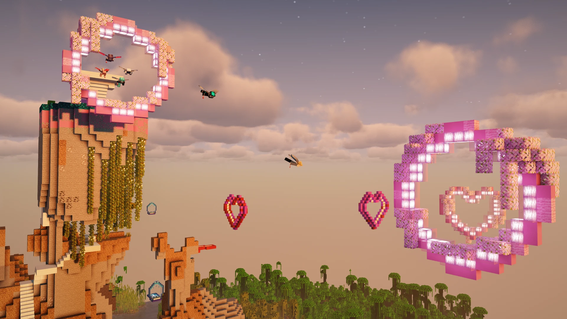 Glowing pink and purple heart-shaped rings above a desert landscape at the Rainbow Elytra launch