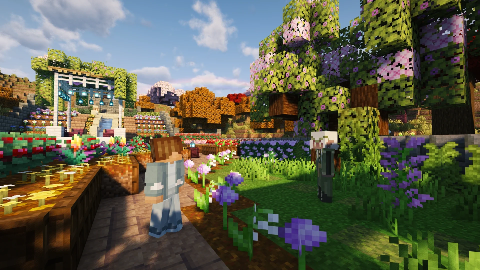 Players exploring the flower-filled Verdahla gardens under blooming trees